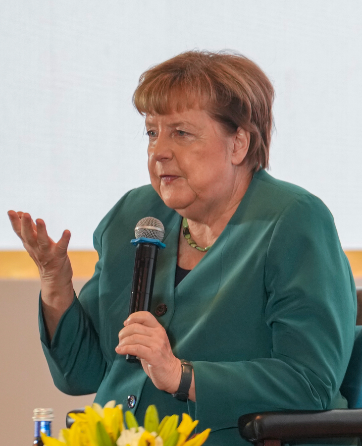 Merkel Commends Singh's Reforms, India's Economic Potential.webp