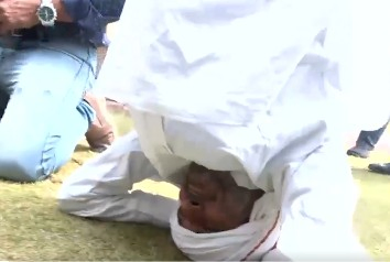 Political Tensions Rise as MLA Undertakes Headstand Demonstration.webp Political Tensions Rise as MLA Undertakes Headstand Demonstration.webp