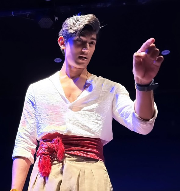 Son Aryaman's Stage Debut: Father's Encouragement.webp