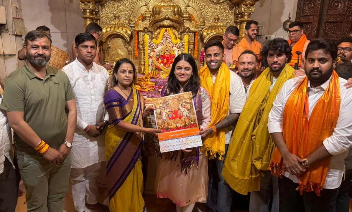 Suryakumar Yadav and Tilak Varma Seek Blessings Ahead of T20 World Cup.webp