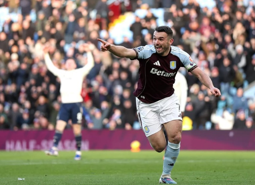 McGinn Returns to Villa Training Amidst United Clash.webp