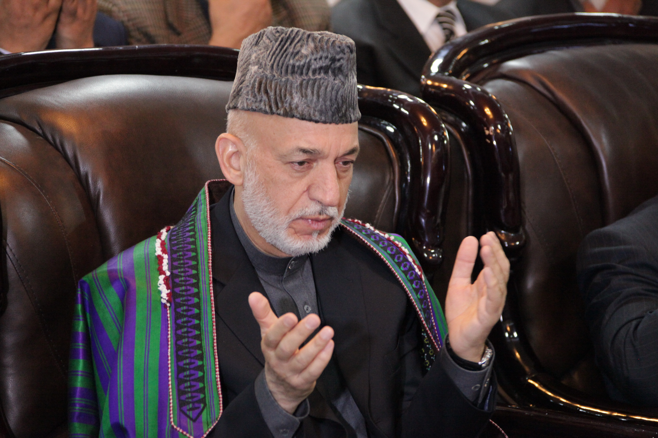Karzai Condemns Pakistani Airstrikes, Calls for Peace.webp
