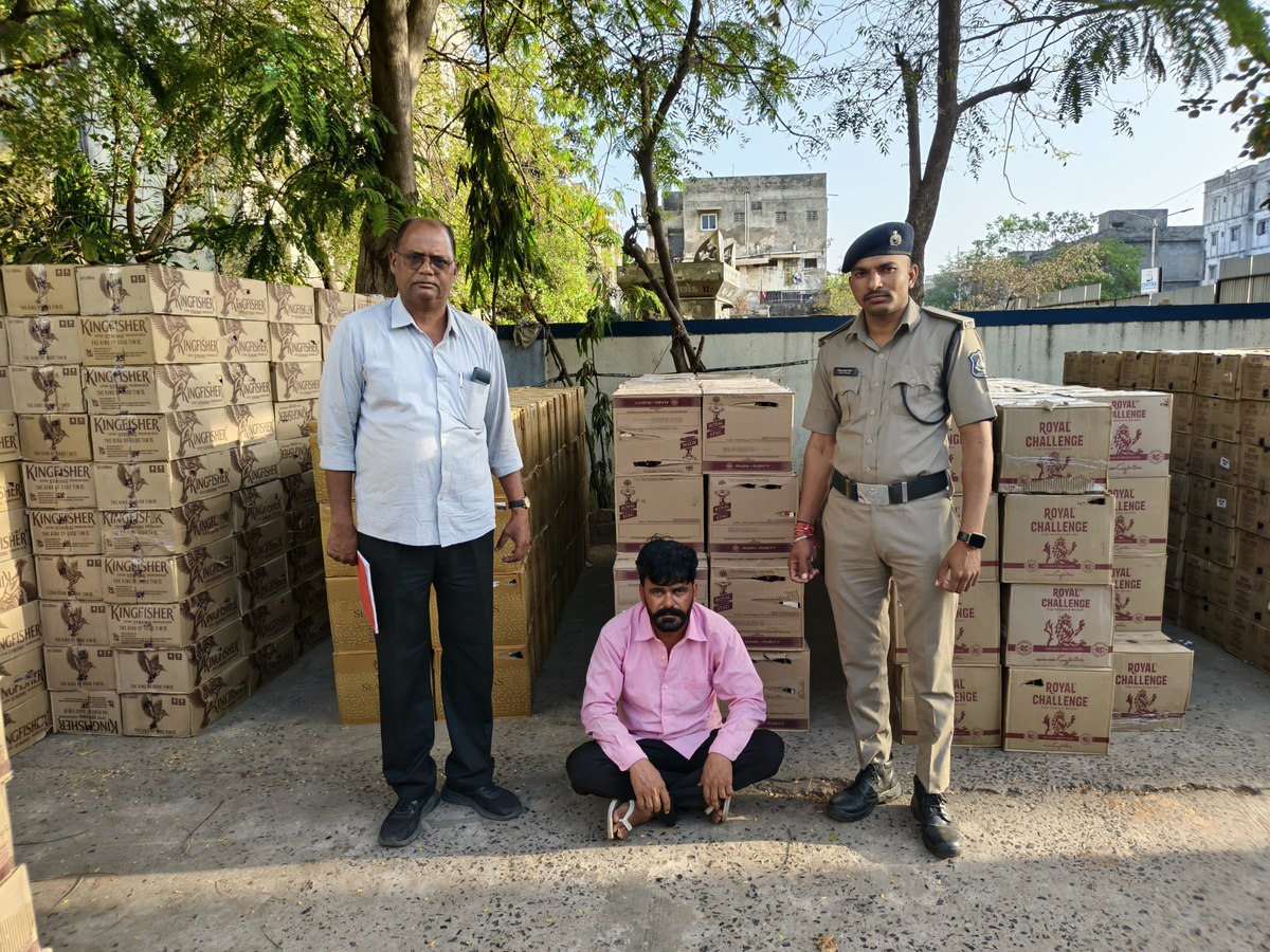 Driver Arrested in Ahmedabad Liquor Smuggling Operation.webp Driver Arrested in Ahmedabad Liquor Smuggling Operation.webp