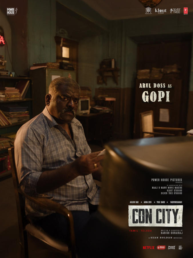 'Con City' Reveals Arul Doss's Role as Moneylender's Target.webp 'Con City' Reveals Arul Doss's Role as Moneylender's Target.webp