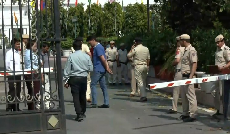 Man Places Bouquet After Breaking Through Delhi Assembly Gate.webp