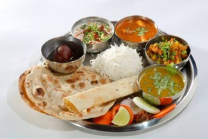 India's Thali Costs: Vegetable Prices Flat, Chicken Costs Decline.webp