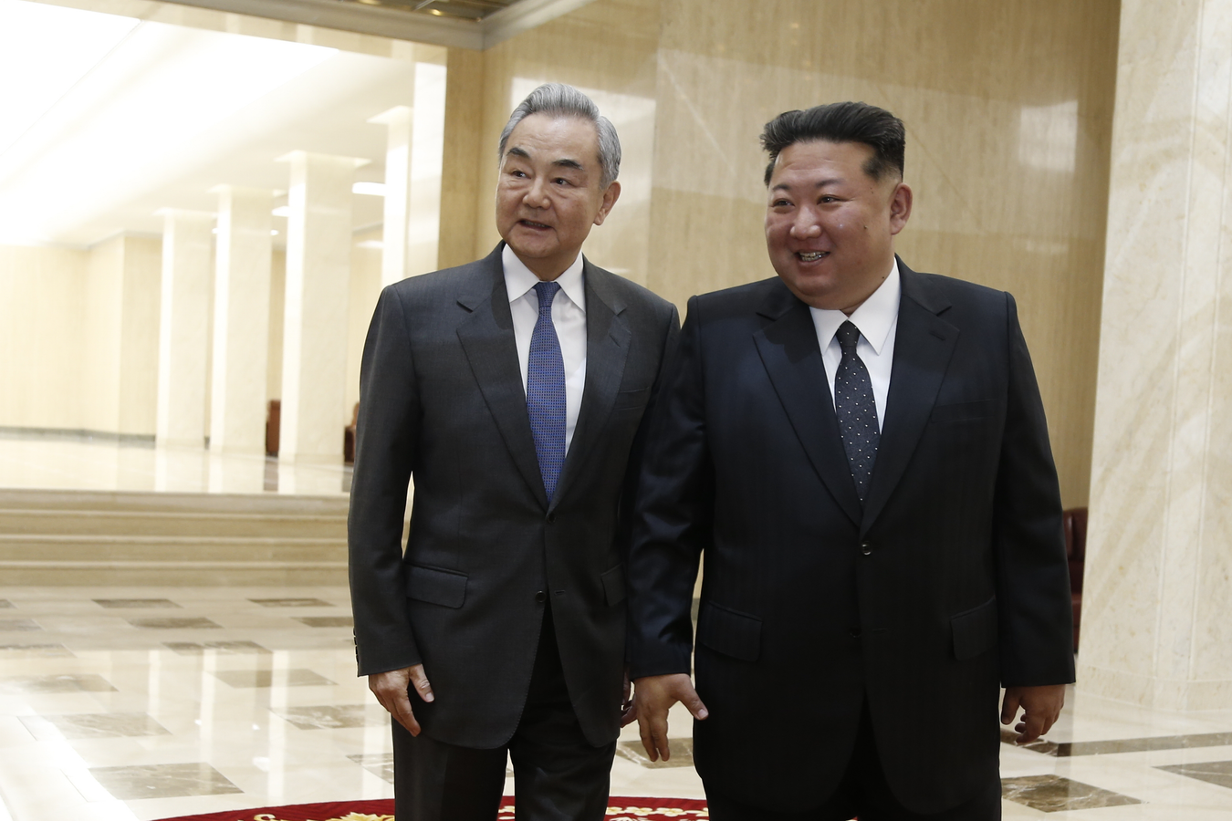 China's Wang Yi Strengthens Ties with North Korea.webp
